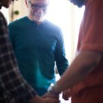 Men praying together