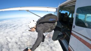 Man jumping out of an airplane