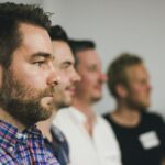 Men standing together - The Zacchaeus Principle: Reaching Men Where They Are