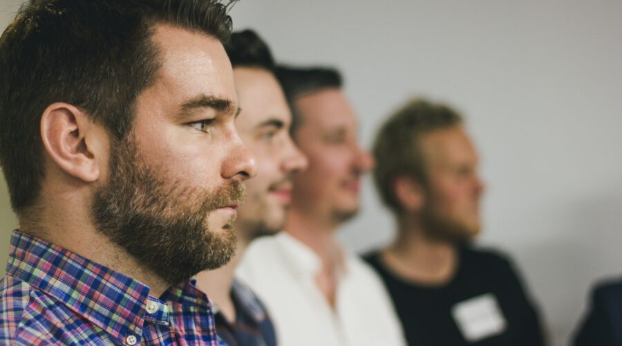 Men standing together - The Zacchaeus Principle: Reaching Men Where They Are
