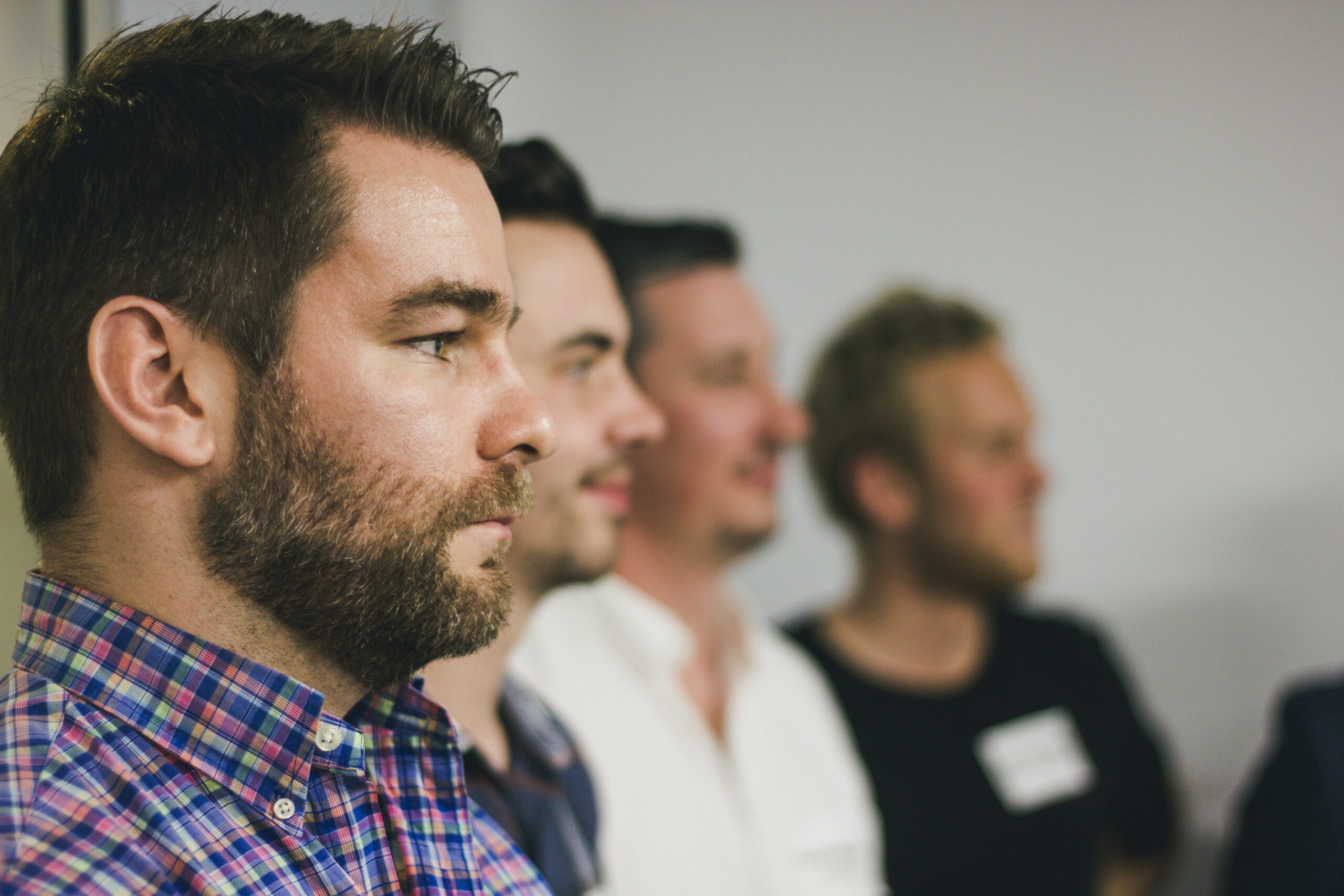 Men standing together - The Zacchaeus Principle: Reaching Men Where They Are